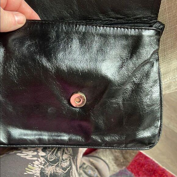 Black and Gold Crossbody Bag with Smooth Texture and Compact Size - Picture 7 of 8